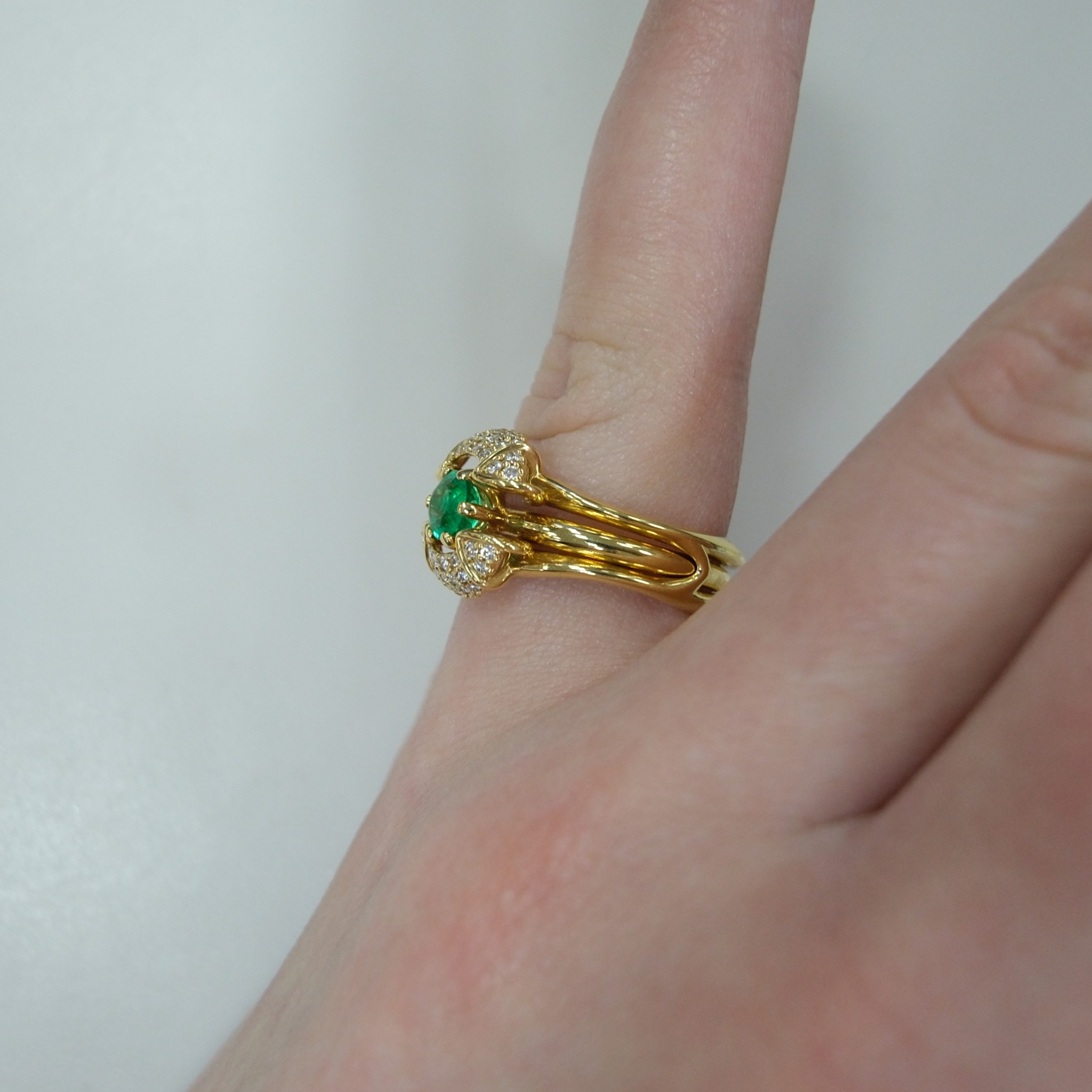 Кольцо-трансформер из желтого золота с изумрудом